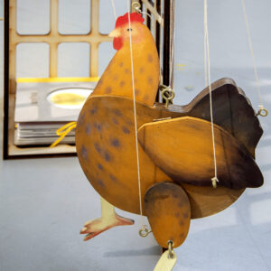 Wooden puppet of hen