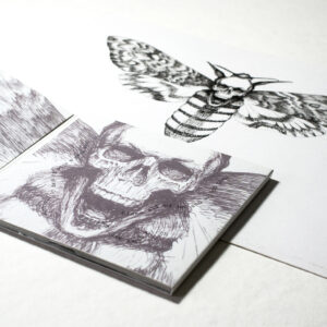 the CD booklet with ink draw of moth